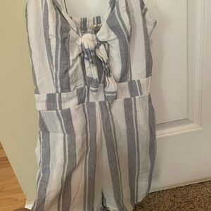 Striped romper with pockets and adjustable straps